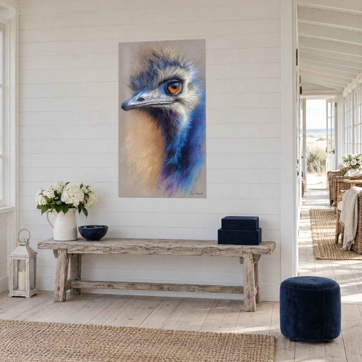 Wall art emu in pastel tones, steel blue beak and violet neck, hanging on a white wood-paneled wall beside a wooden bench