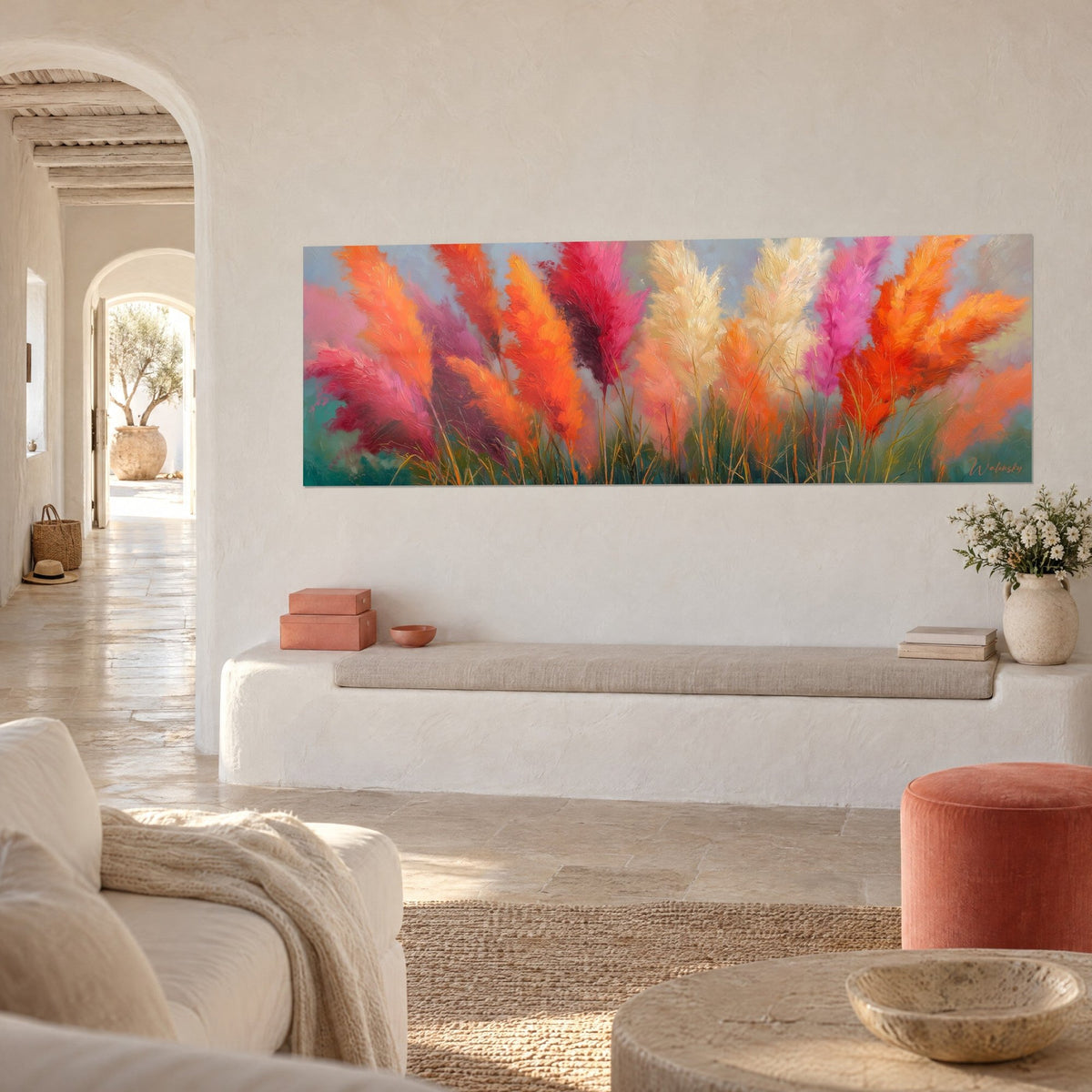 Wall art bundles of fluffy plumes in coral and magenta on golden stems, blue-grey background, white wall of a Mediterranean home