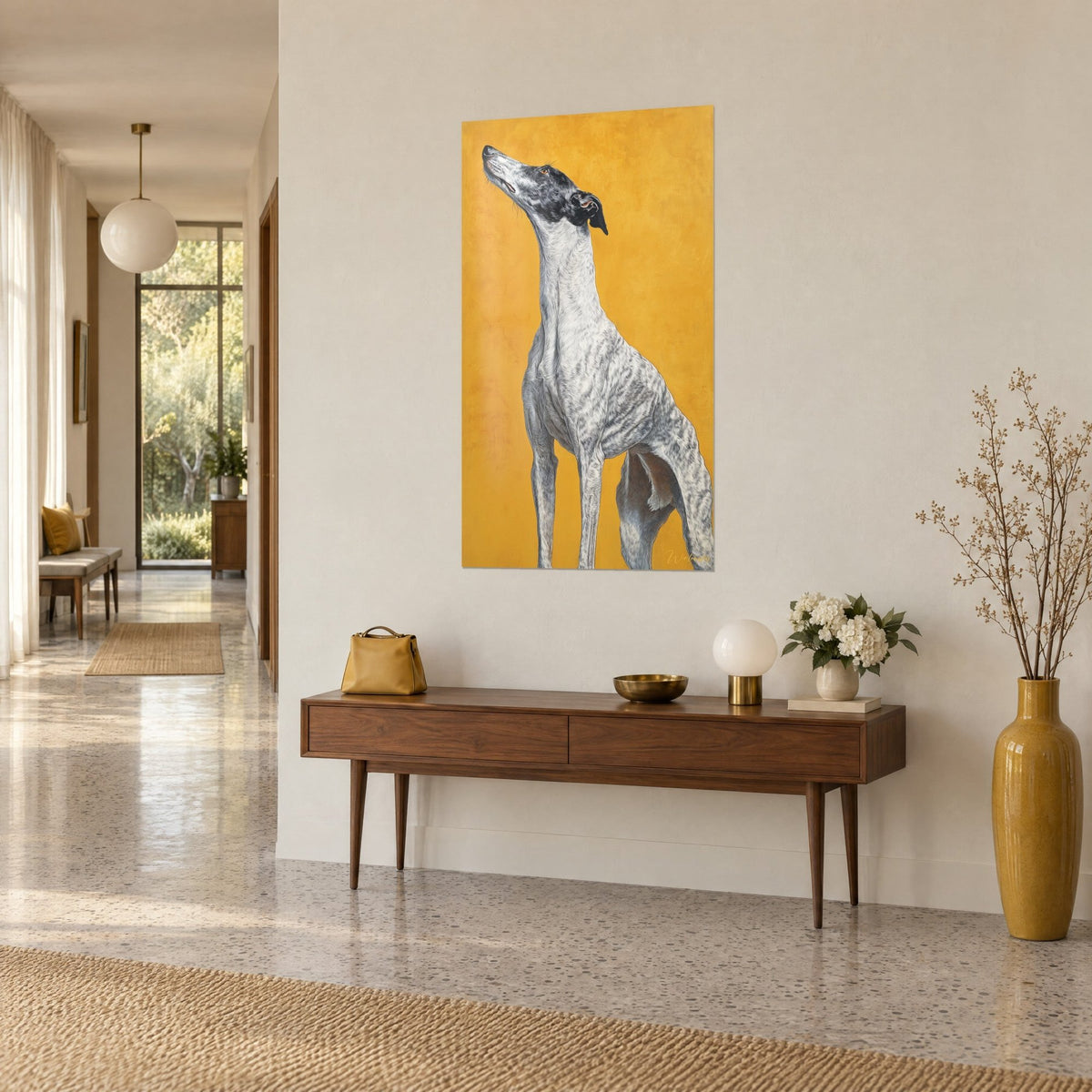 Wall art slender dog with stretched neck, white coat striped in black in front of a mustard yellow backdrop, wooden console table and gilded vase