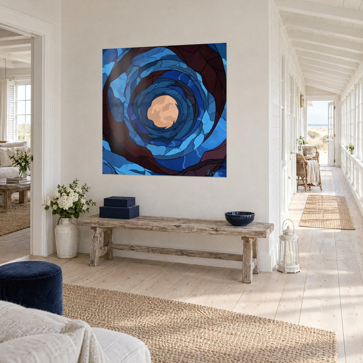 Wall art celestial vortex with navy and burgundy layers around a peach moon disc, hallway by the sea