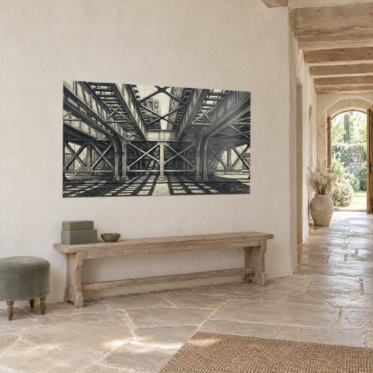 Tableau charpente d'acier en croix de Saint-André, gris anthracite et beige crème, sur un mur de pierre près d'une arche de campagne