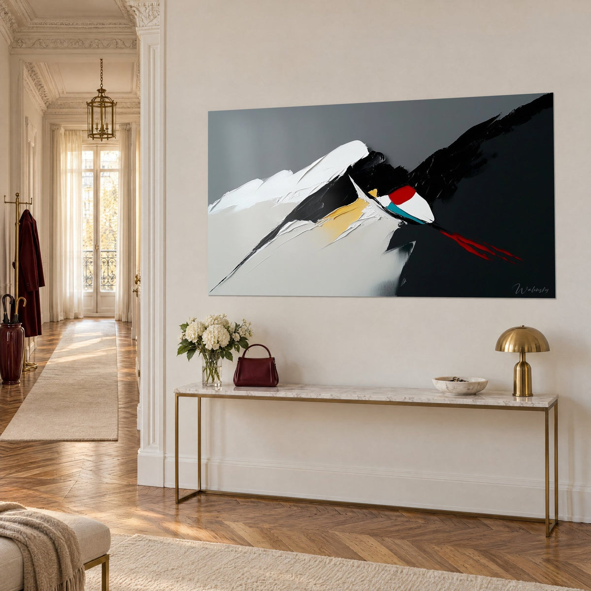 Wall art stylized snowy peak, black and anthracite grey blocks, red flow, seen from three-quarters above a gold console