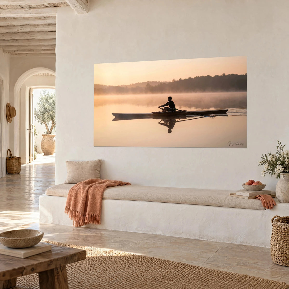 Wall art racing shell gliding through golden haze, dark shorelines and rosy water, three-quarter view in a Mediterranean living room