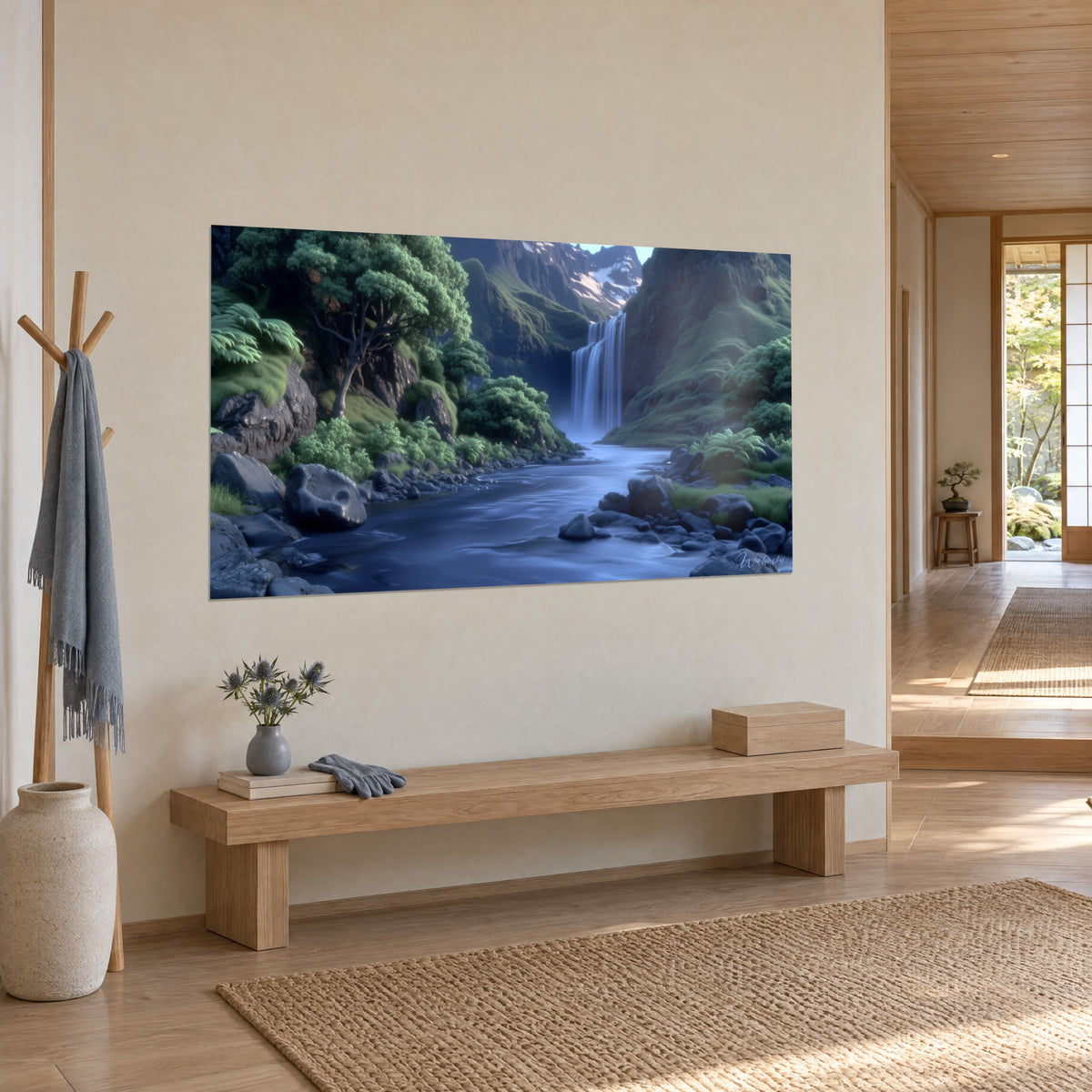 Wall art mountain stream with vivid green ferns, slate blue water and snowy peaks, hung in a japandi hallway