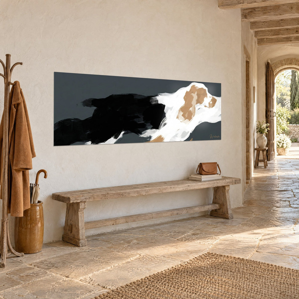 Wall art stylized hunting dog, black mass and white coat speckled with beige on charcoal grey, wooden bench, stone house
