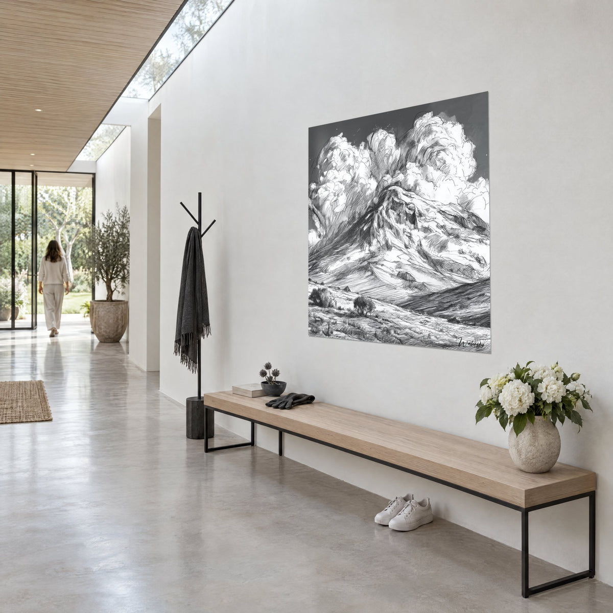 Wall art crater beneath turbulent white and anthracite cumulus clouds, three-quarter view in a light concrete hallway