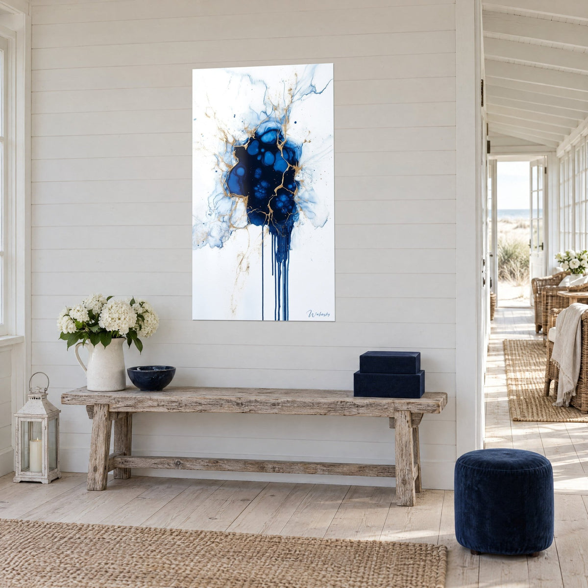 Wall art cobalt blue and white celestial fusion, gold filaments and vertical drips, three-quarter view beside a wooden console