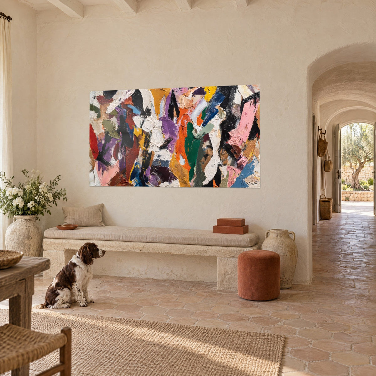 Wall art abstract canvas of pink, blue and black flat areas with thick impasto, spaniel sitting on the floor, stone bench of a farmhouse