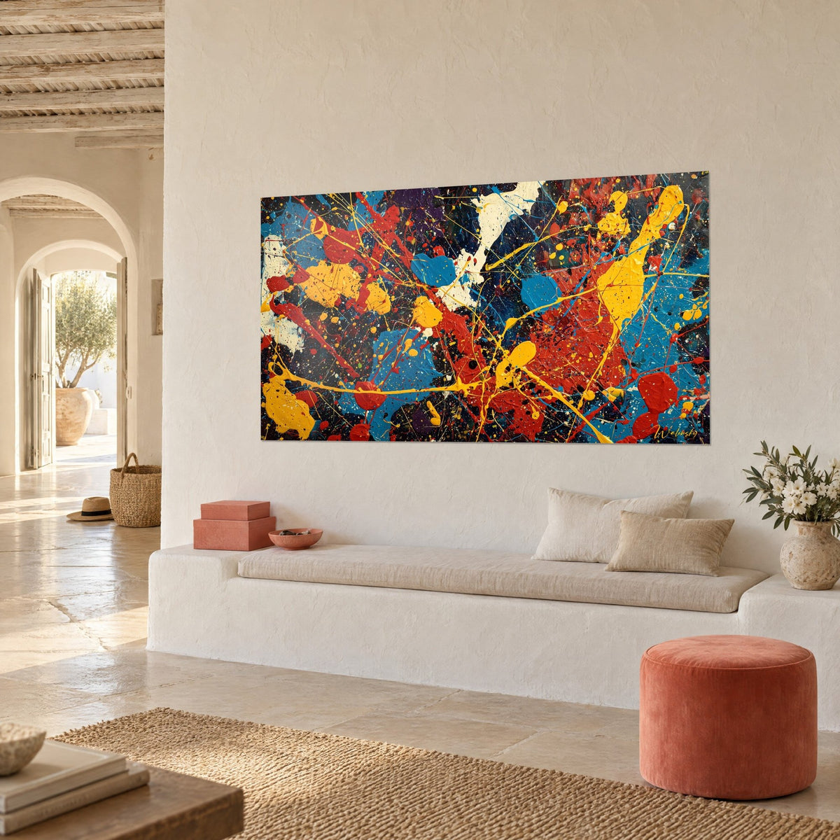 Wall art of an abstract paint explosion, cobalt blue spots and mustard yellow streaks, three-quarter view of a stone bench