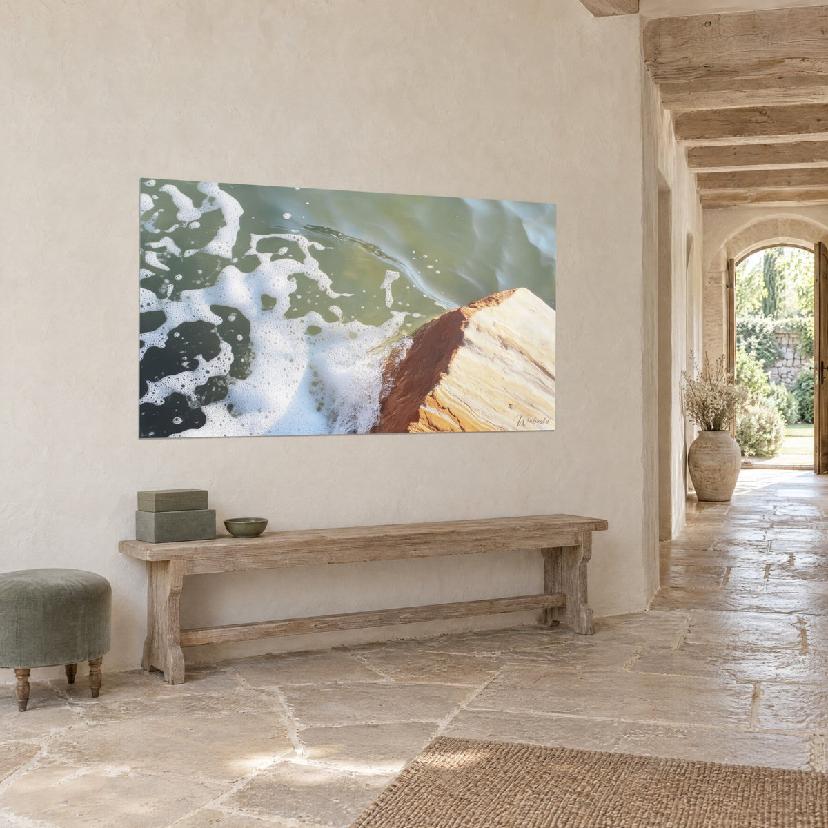 Wall art foamy wave licking a rust and cream stone, olive green water, hung on the wall of a stone entryway