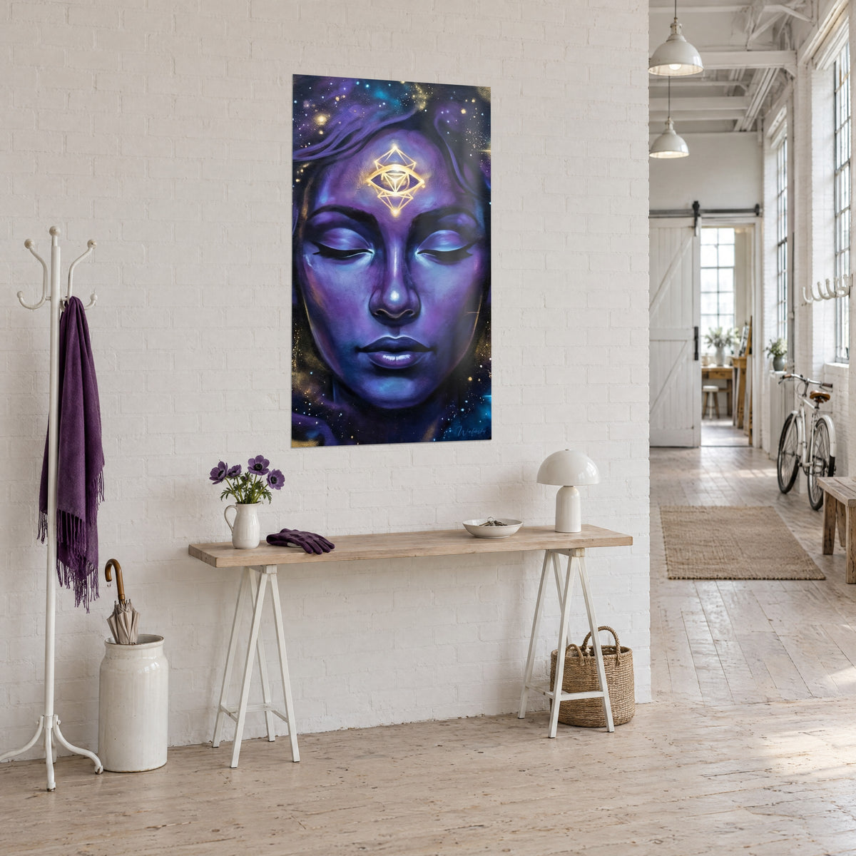 Wall art portrait with closed eyelids, forehead adorned with a golden eye, indigo and violet starry night, console in an artist's loft