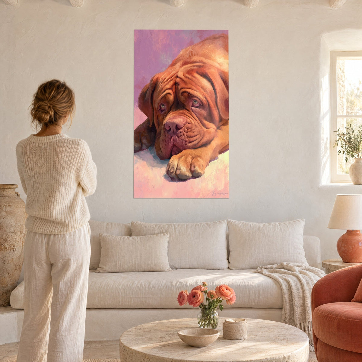 Wall art tawny Bordeaux mastiff, pink muzzle resting on paw, mauve and pink background, above a sofa in a bright living room