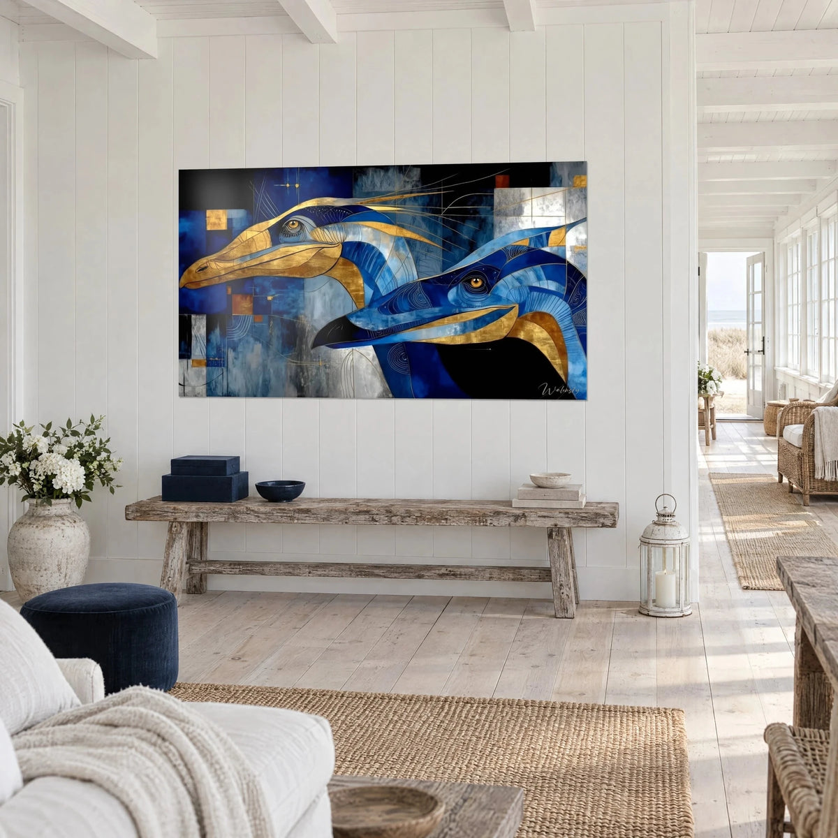 Wall art stylized marine reptiles, golden beaks and midnight blue crests on silver grey background, hung above a raw wood console