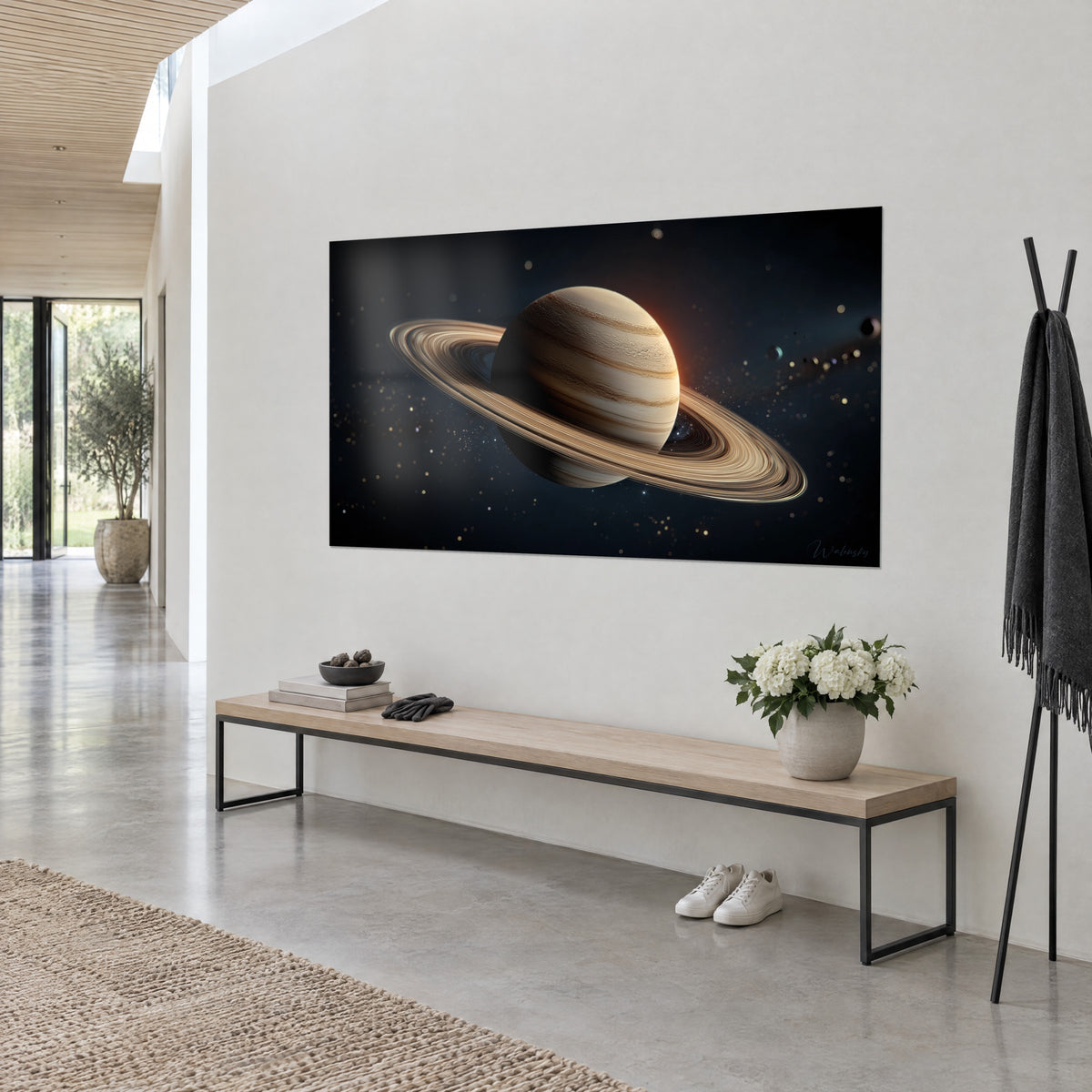 Wall art striped giant planet in beige and brown, copper glow on the left, hung at an angle above a light wood bench