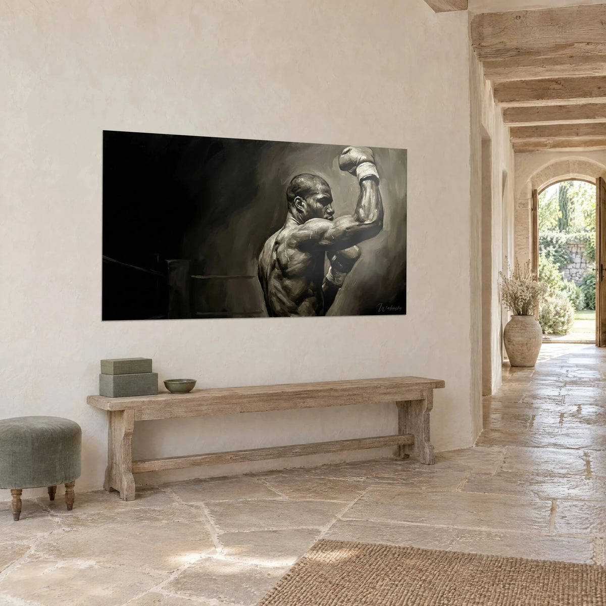 Wall art of a prizefighter with a swollen biceps and white-wrapped glove, sepia tones and deep black, on a rendered wall, stone entryway