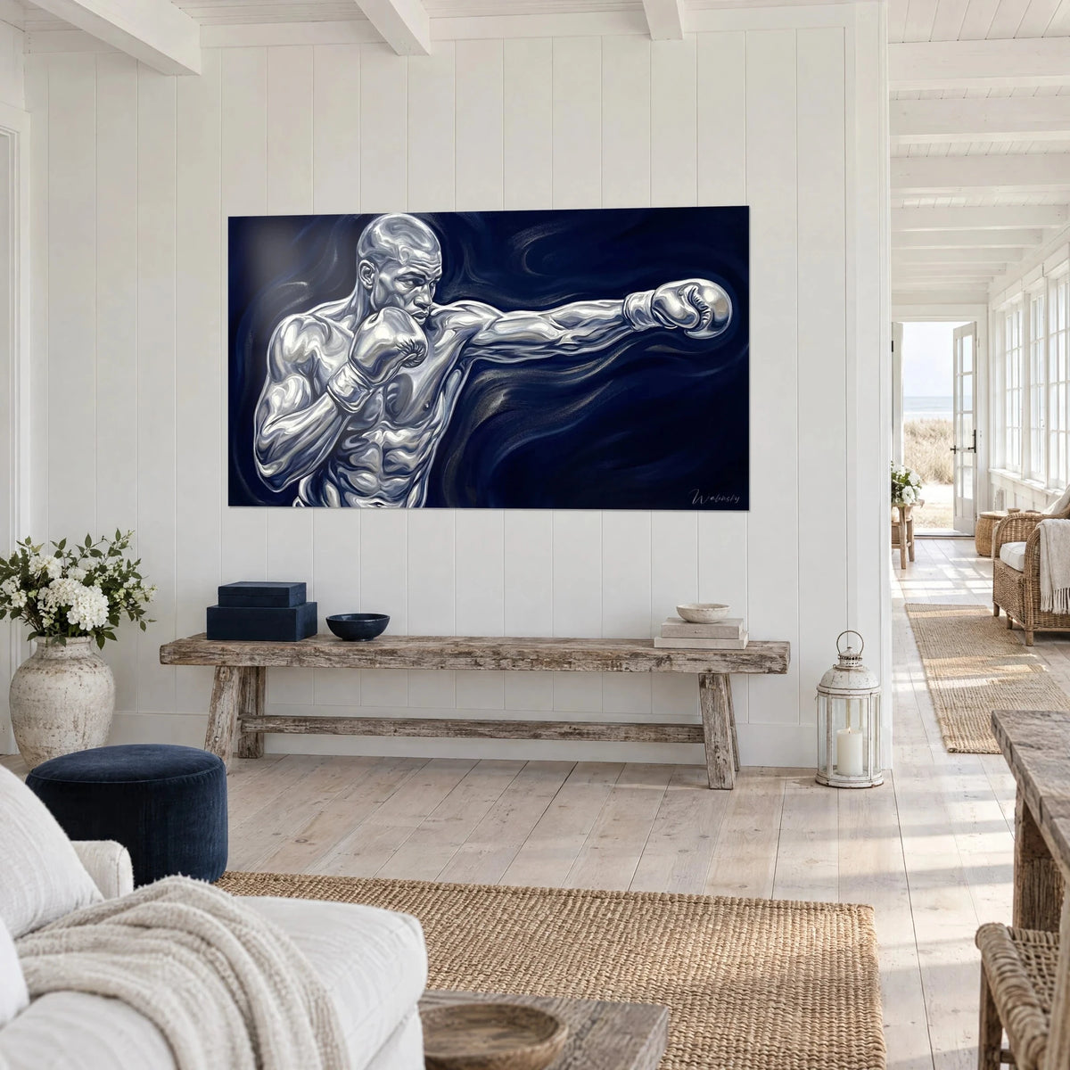 Wall art silver boxer with a cocked hook, glistening gloves and sharp abs on deep navy blue, hung above a raw wooden bench