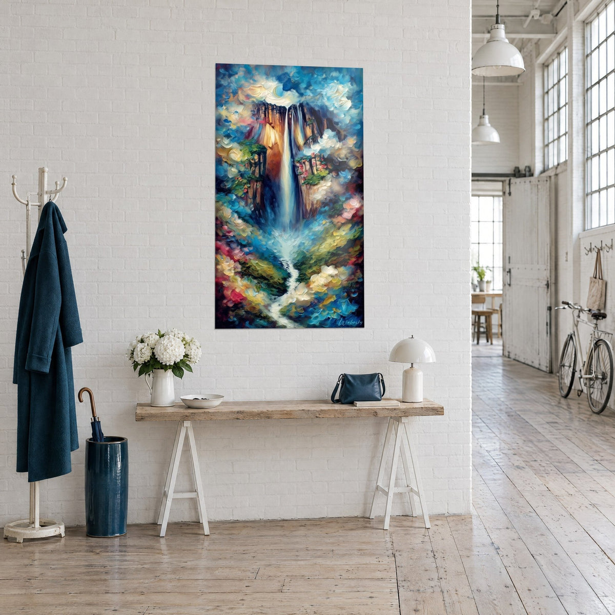 Tableau chute d'eau ivoire jaillissant d'un plateau brun, nuages turquoise et touches rouges, sur un mur blanc de loft