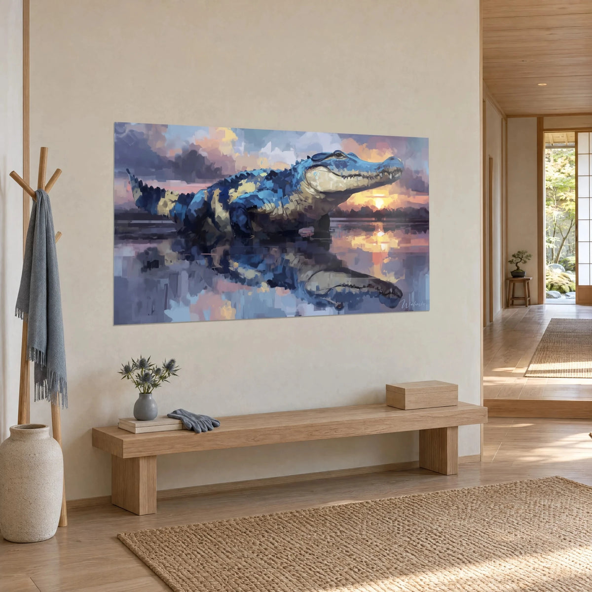 Wall art of a lizard with indigo and ochre plates, pink and lavender sky seen from three-quarter view, on a beige wall beside a wooden bench