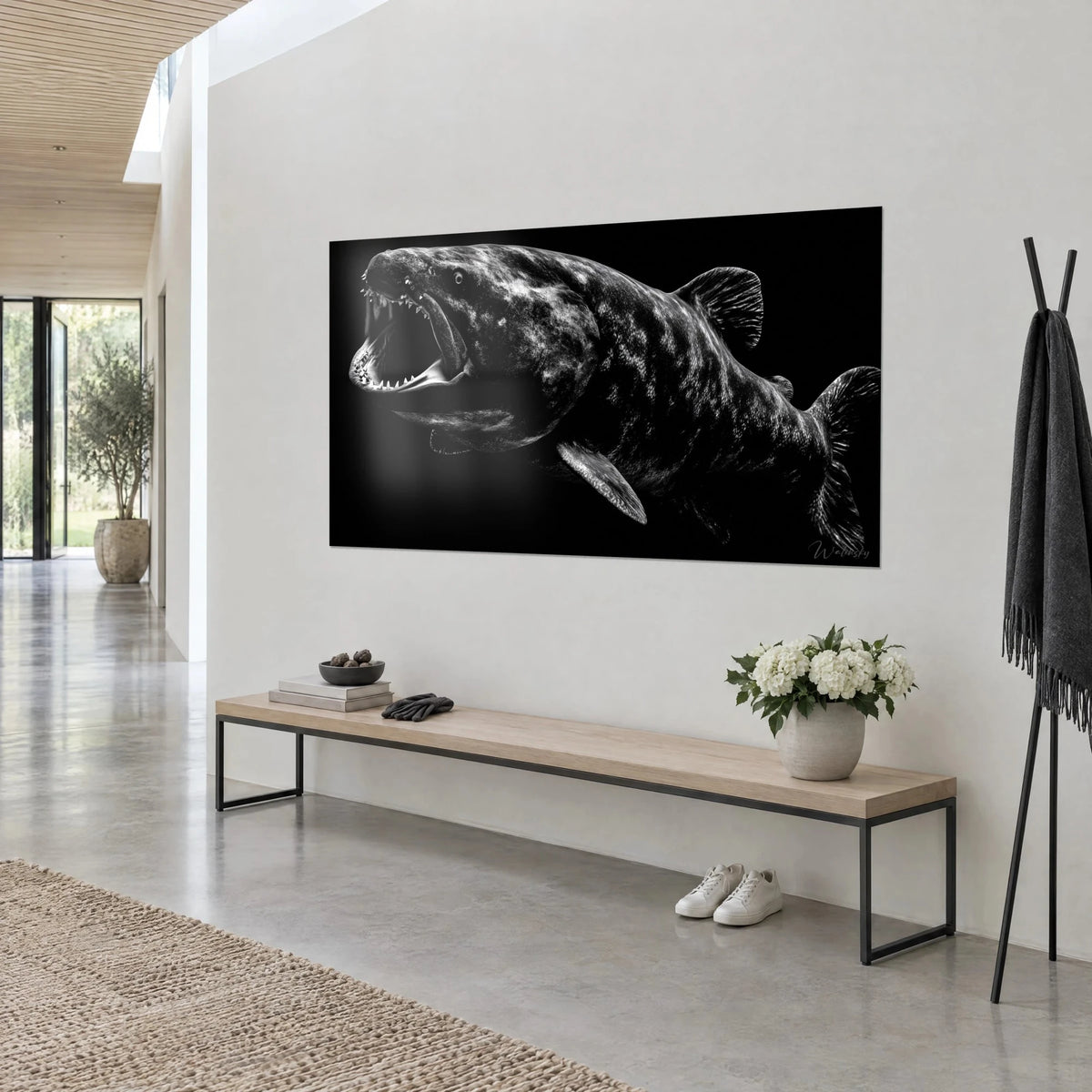 Wall art Dunkleosteus in black and white, grey bony plates, striped fins, three-quarter view, cream white wall, wooden bench