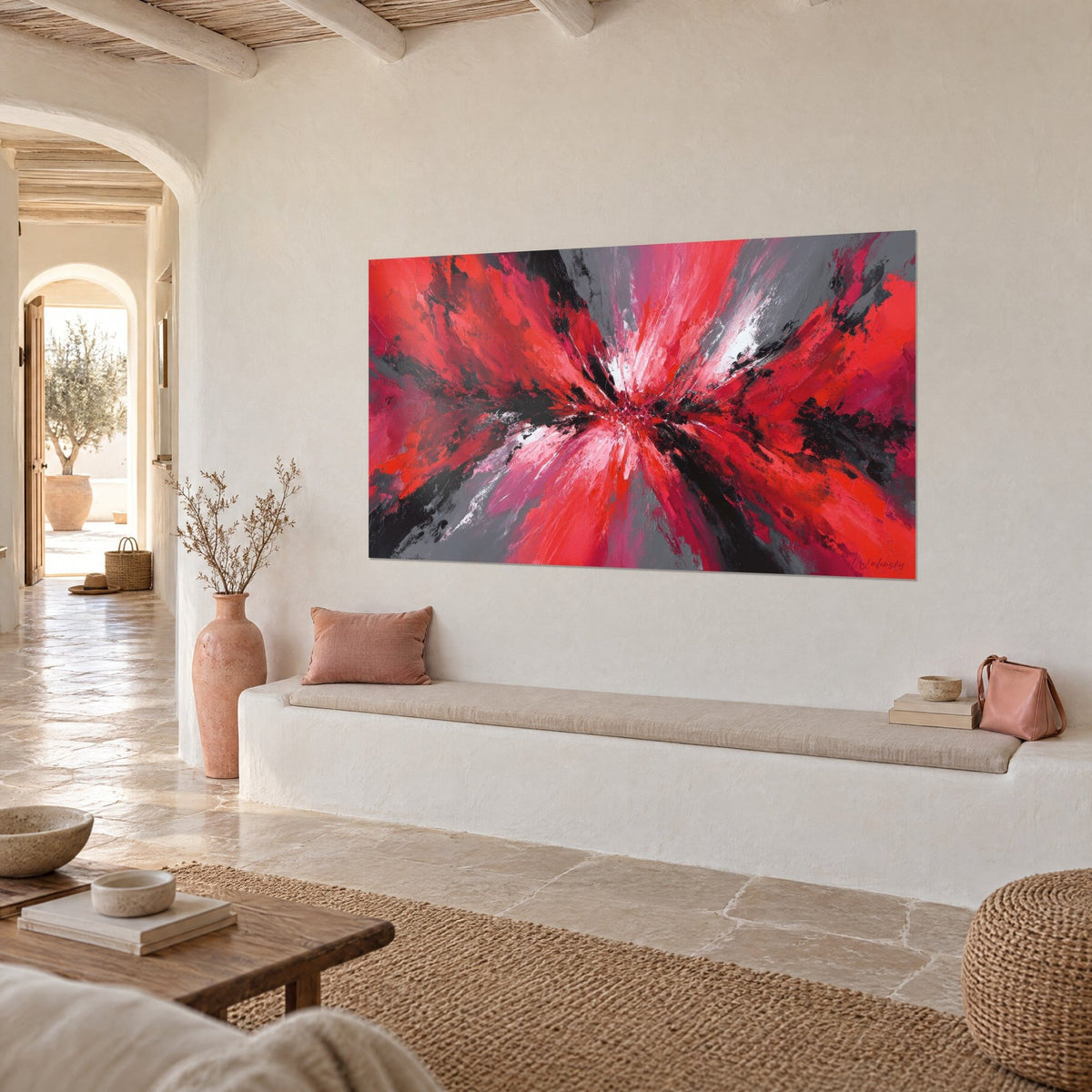 Wall art purple burst with scarlet sprays and black streaks, three-quarter view, above a white banquette