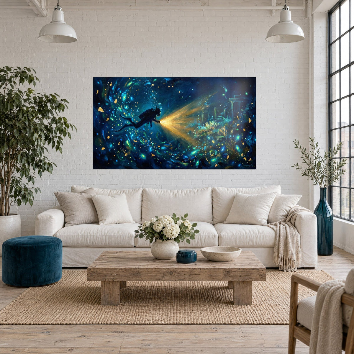 Wall art silhouetted diver, golden light beam over midnight blue and turquoise ruins, above a sofa in a bright living room