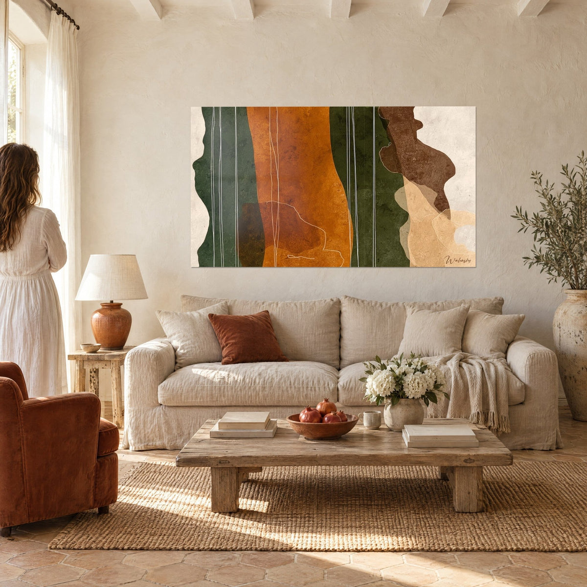 Wall art abstract female silhouettes in fir green and burnt ochre, white thin lines, above a sofa in a bright living room