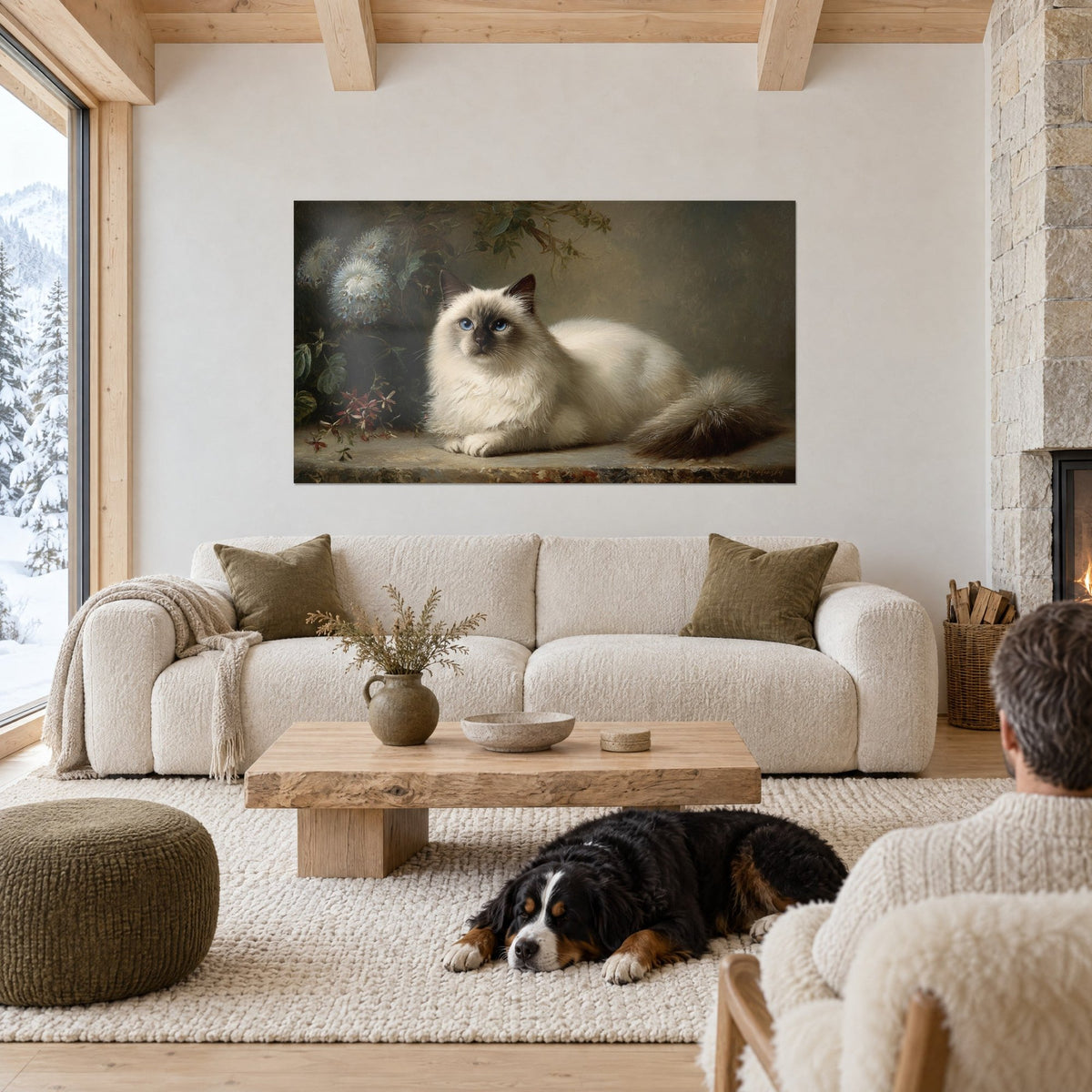Tableau chat Birman au pelage crème et masque brun, yeux bleus, fleurs bleutées, au-dessus d'un canapé dans un salon lumineux