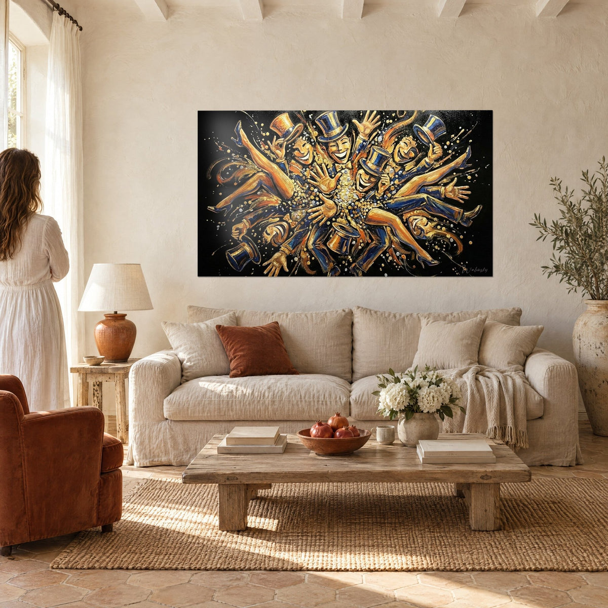 Wall art dancers in midnight-blue top hats, arms raised and dazzling smiles, golden splashes, above a sofa in a bright living room