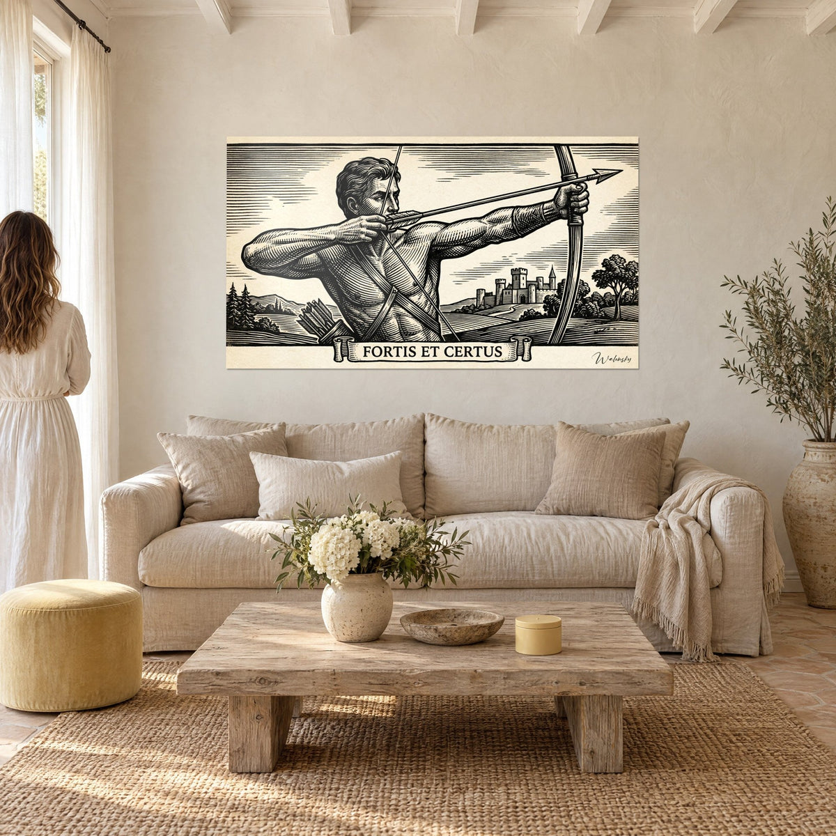 Tableau archer bandant son arc en gravure noir et ivoire, château au loin, mur crème, au-dessus d'un canapé dans un salon lumineux