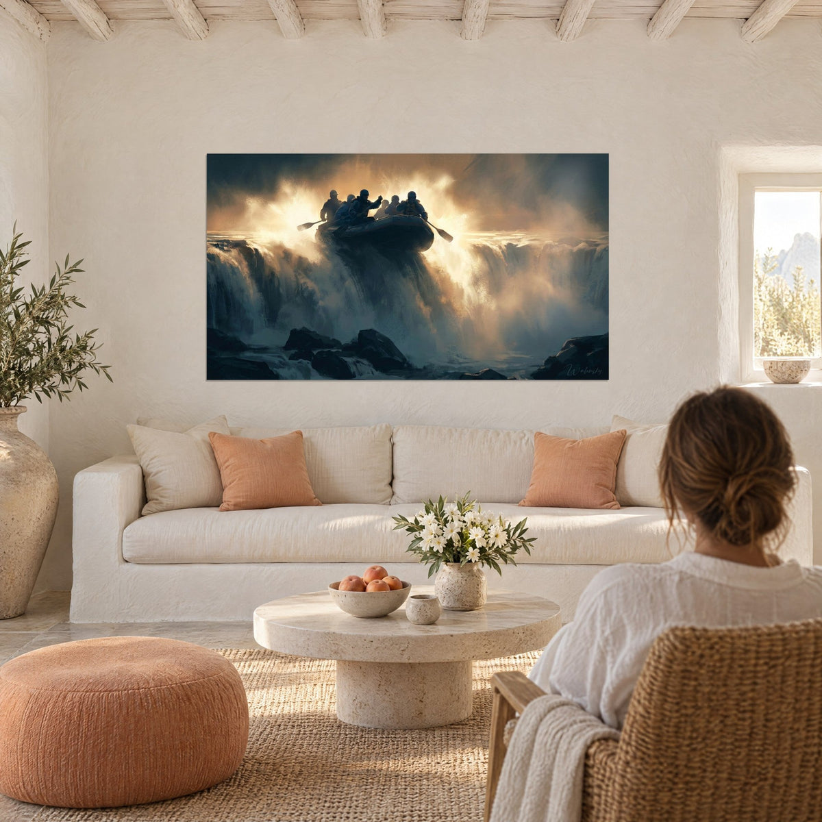 Wall art rafting boat launching over a misty waterfall, golden ochre and midnight blue, two people seen from behind, above a sofa in a bright living room