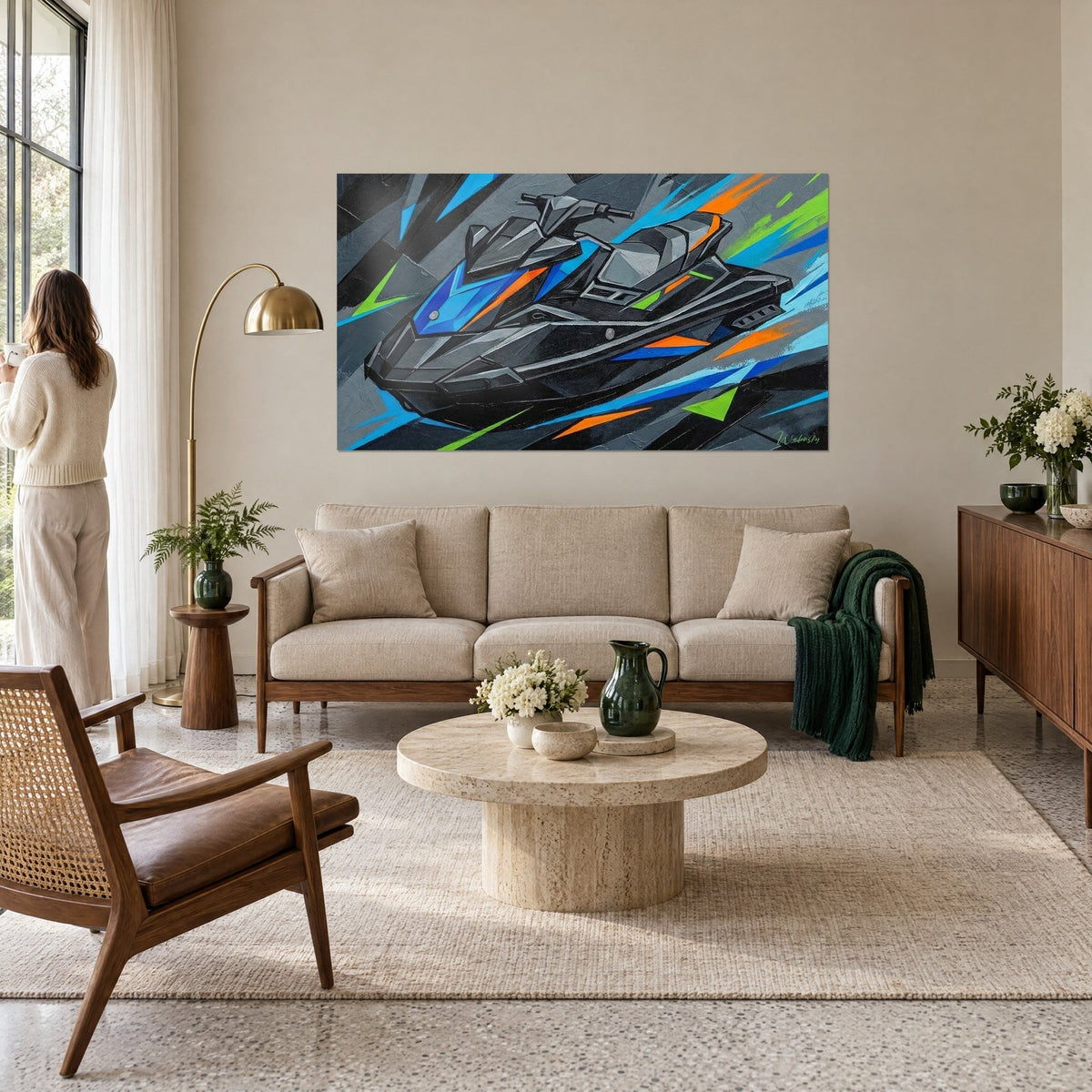 Wall art black sea scooter with electric blue and orange faceted planes, green highlights, woman seen from behind above a sofa in a bright living room