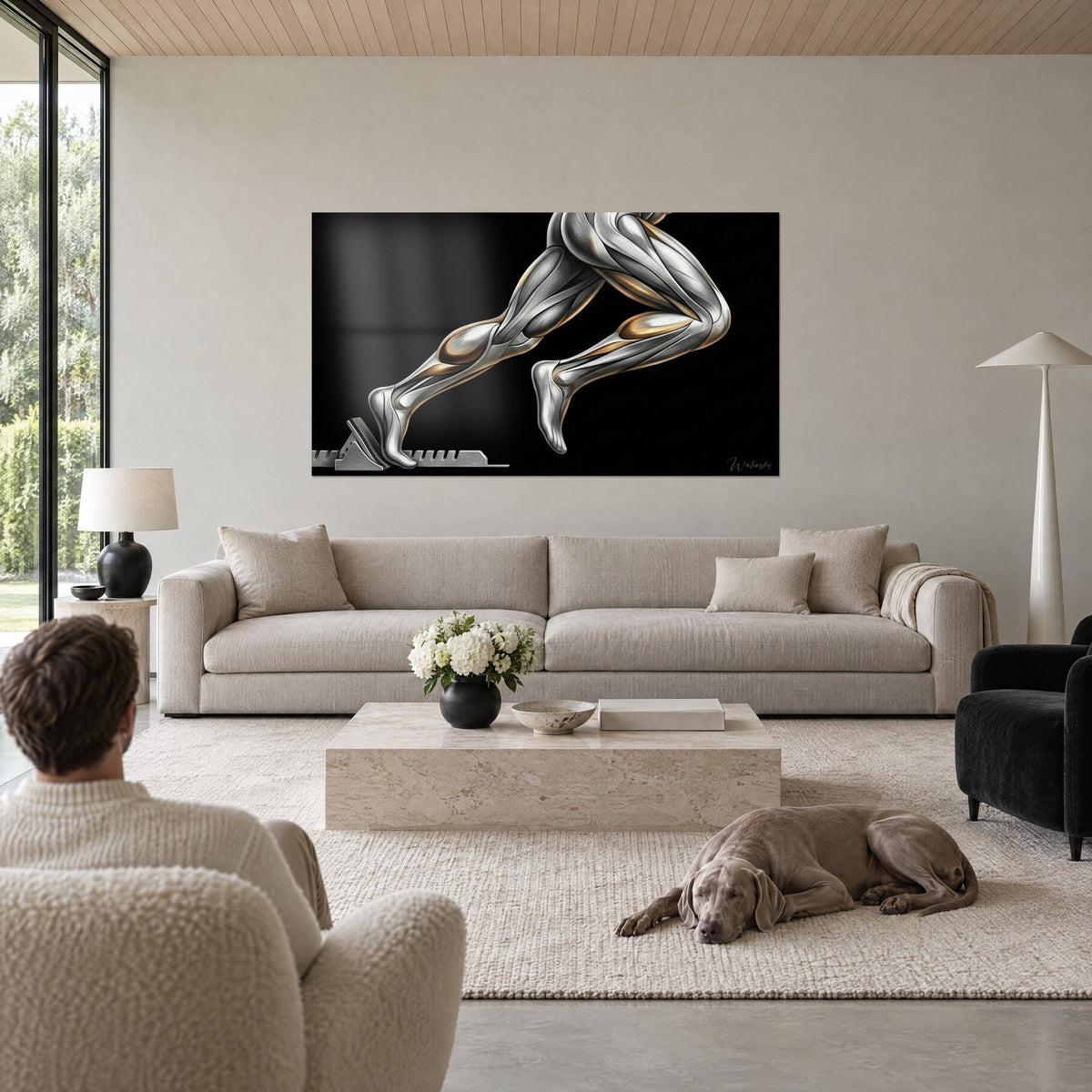 Wall art sprinter in full drive, silver muscles with copper highlights on black background, above a sofa in a bright living room