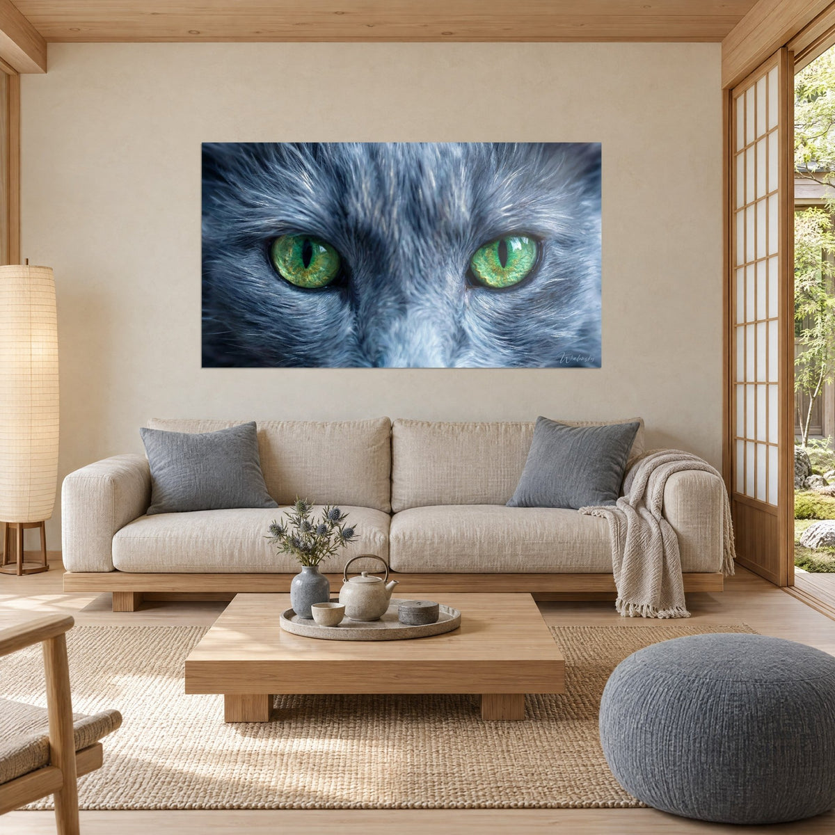 Wall art Nebelung cat with emerald eyes, tousled blue-grey fur, above a sofa in a bright living room