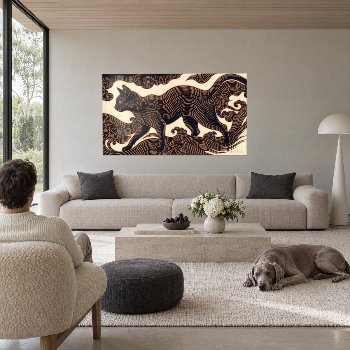 Wall art of a black cat striding, fur etched with copper lines on a cream background, swirling ornamental curls, above a sofa in a bright living room
