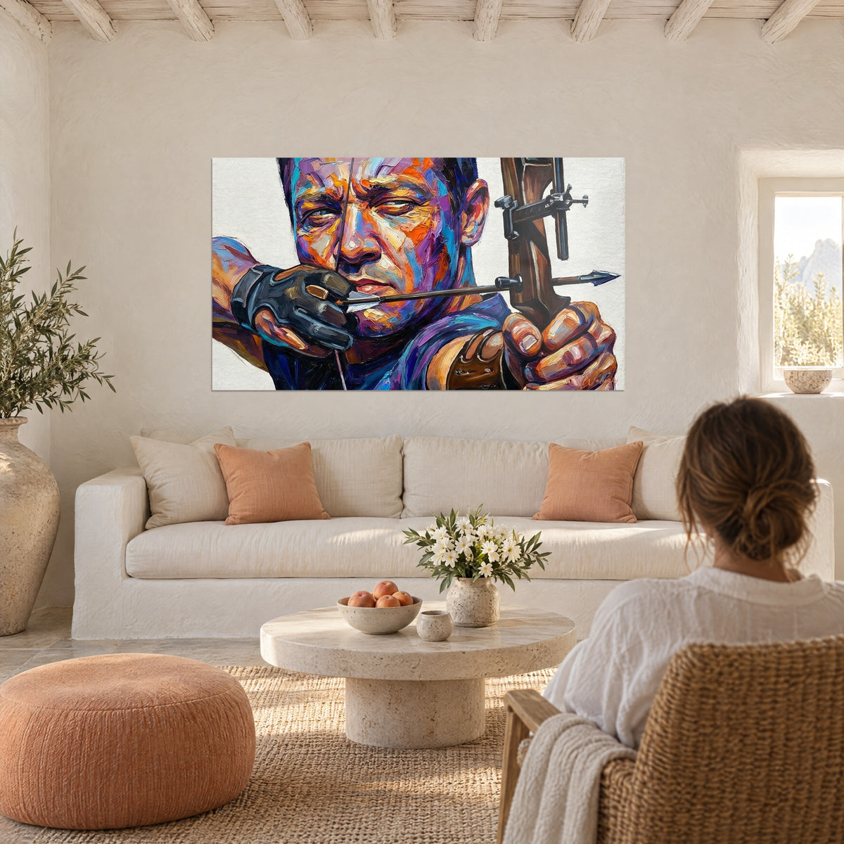 Tableau archer bandant son arc, visage violet et orange, gant noir, au-dessus d'un canapé dans un salon lumineux