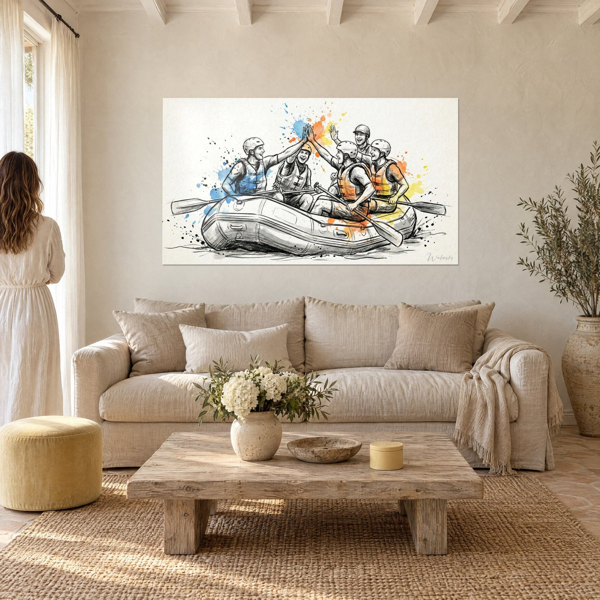 Wall art five rafters in orange and blue vests, hands raised in rhythm, yellow splashes, above a sofa in a bright living room