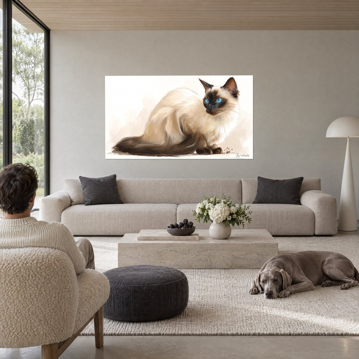 Wall art Balinese cat with cream coat and brown mask, azure blue eyes, above a sofa in a bright living room
