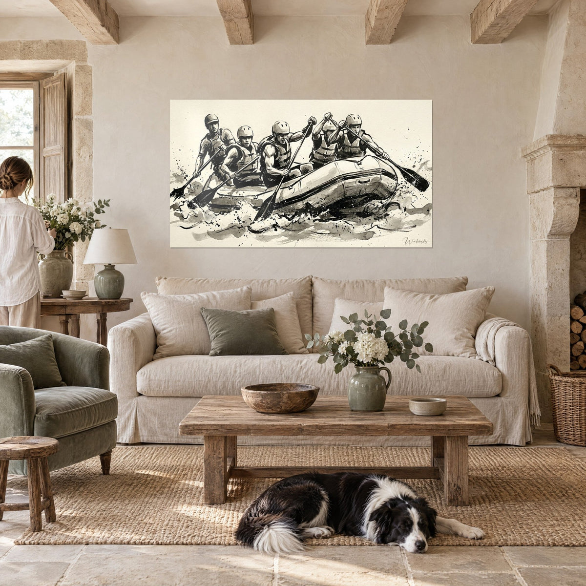 Wall art rafting crew paddling in black ink on cream paper, grey splashes, above a sofa in a bright living room