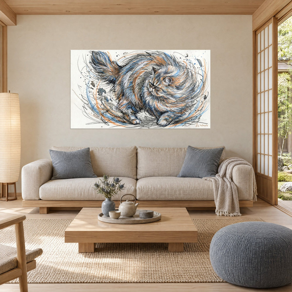 Wall art Persian cat bristling in a swirl of blue and orange strokes on a cream background, above a sofa in a bright living room