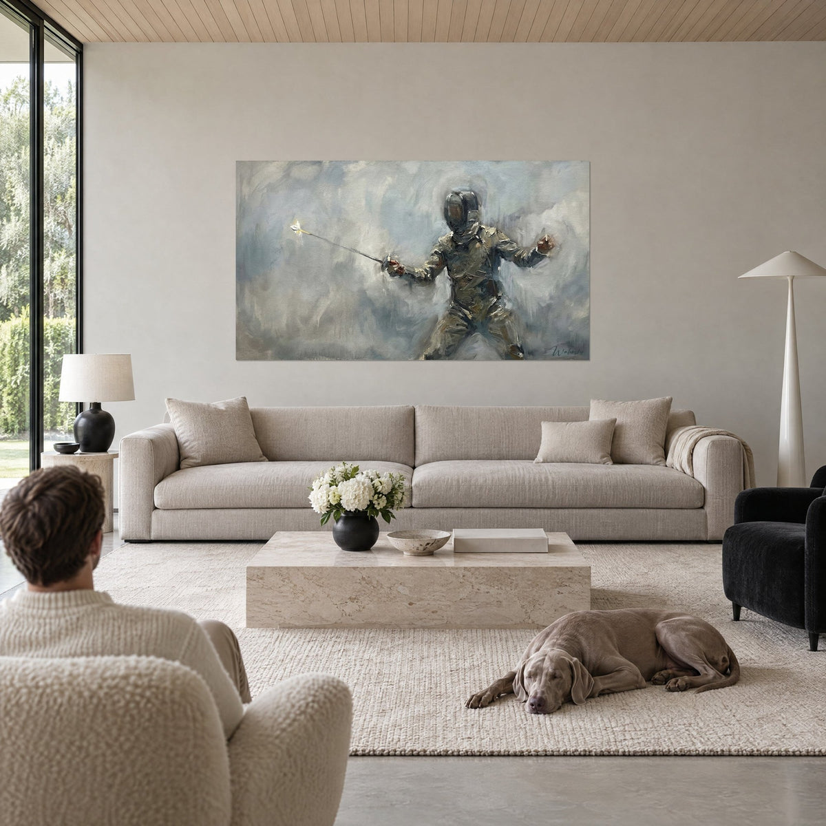 Wall art of a masked fencer in a full lunge, sparkling foil, blue-grey and brown tones, above a sofa in a bright living room