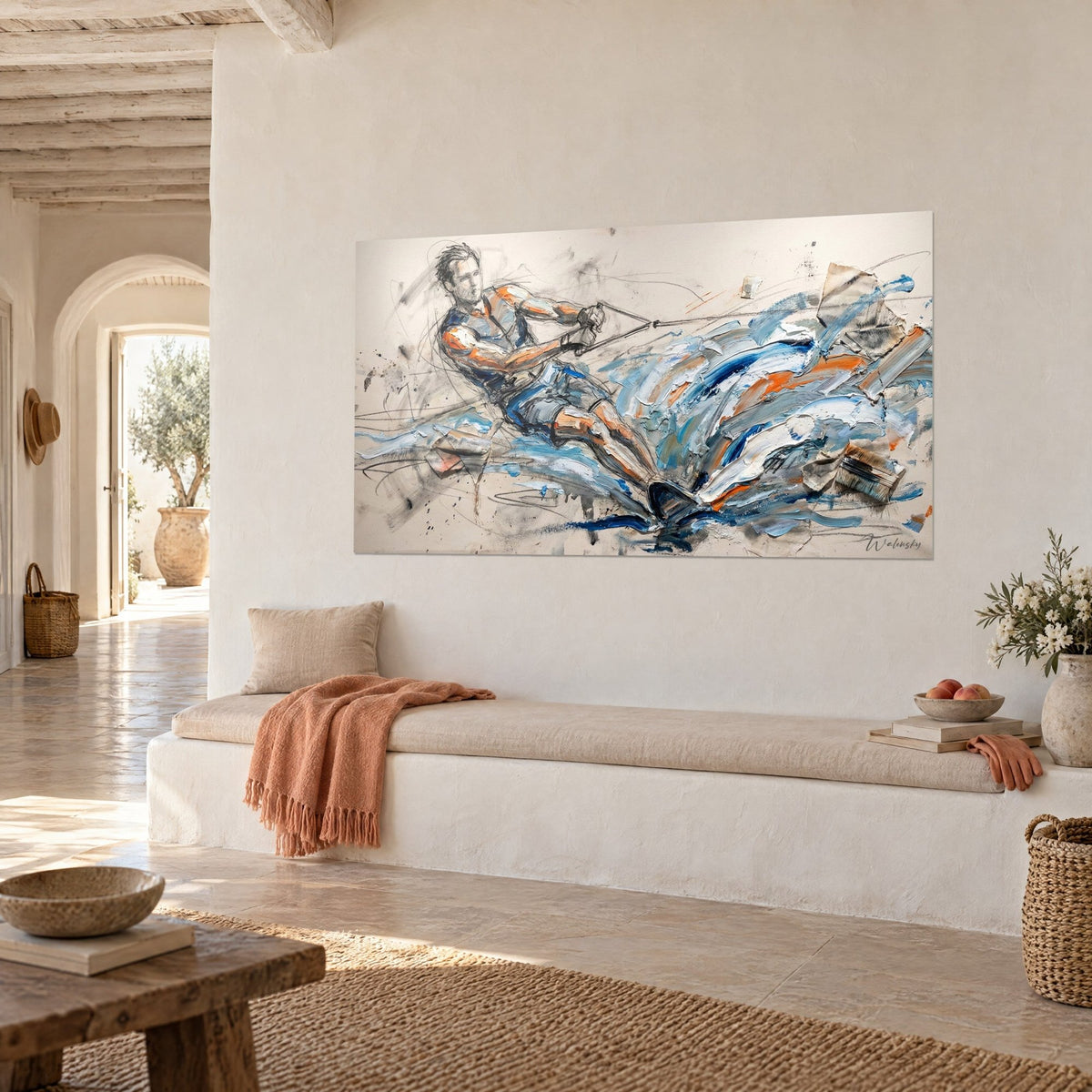 Wall art of a sketched wakesurfer riding a wave of sky blue and orange foam, three-quarter view, white banquette and coral throw