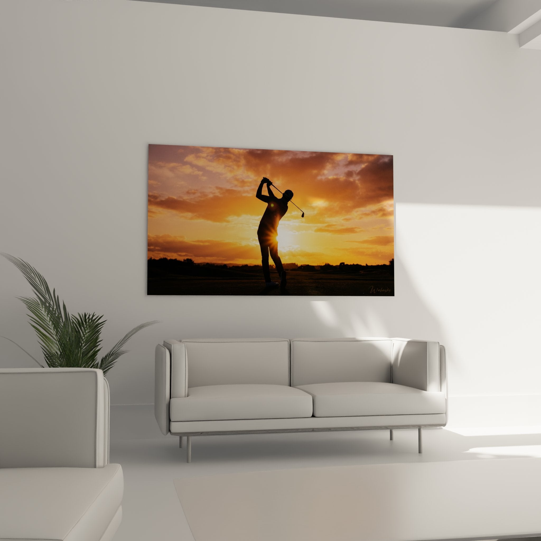 Detail tableau golf silhouette swing parfait contre lumiere soleil couchant nuances orangees