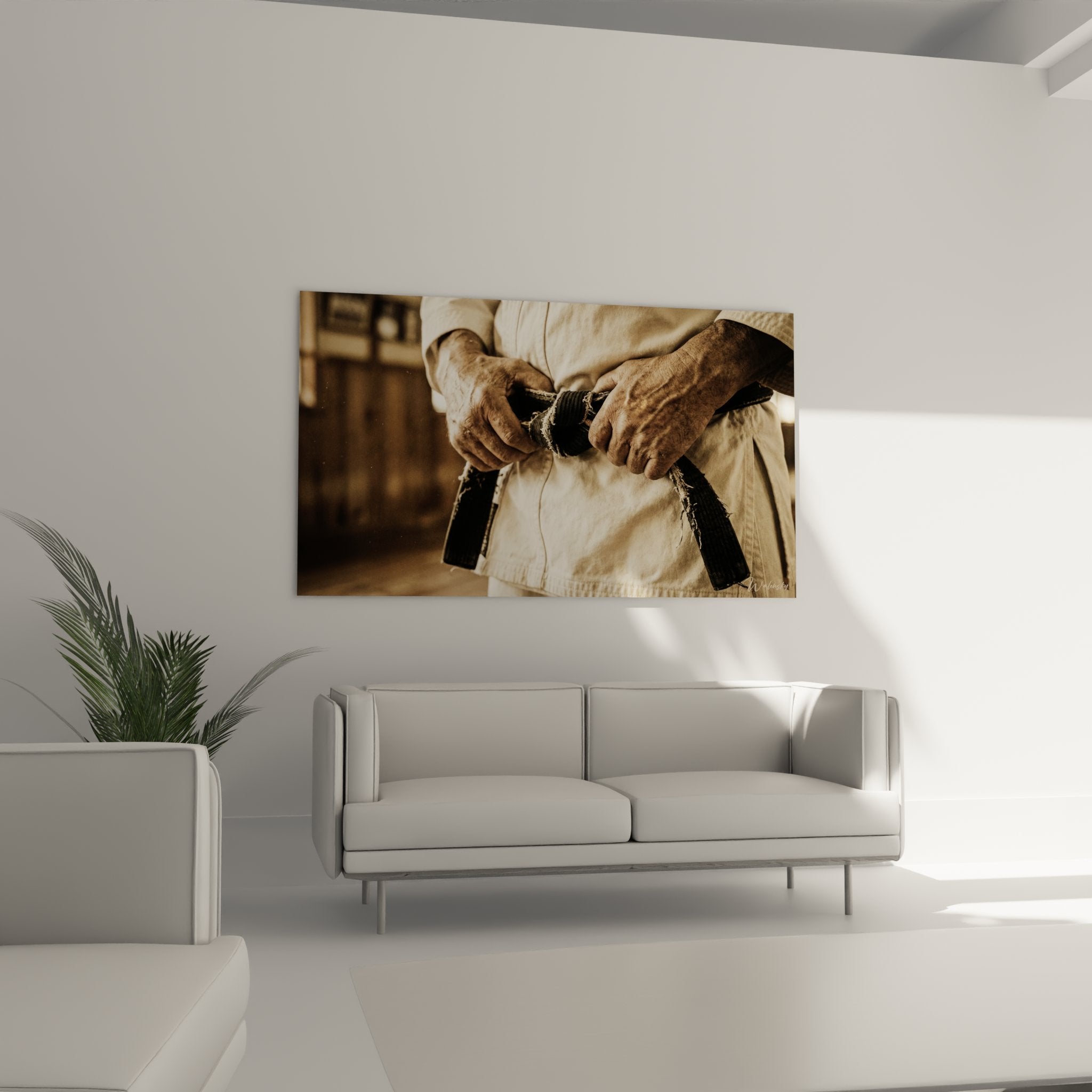 Gros plan mains expertes karateka nouant ceinture noire usee sur karategi blanc art martial traditionnel