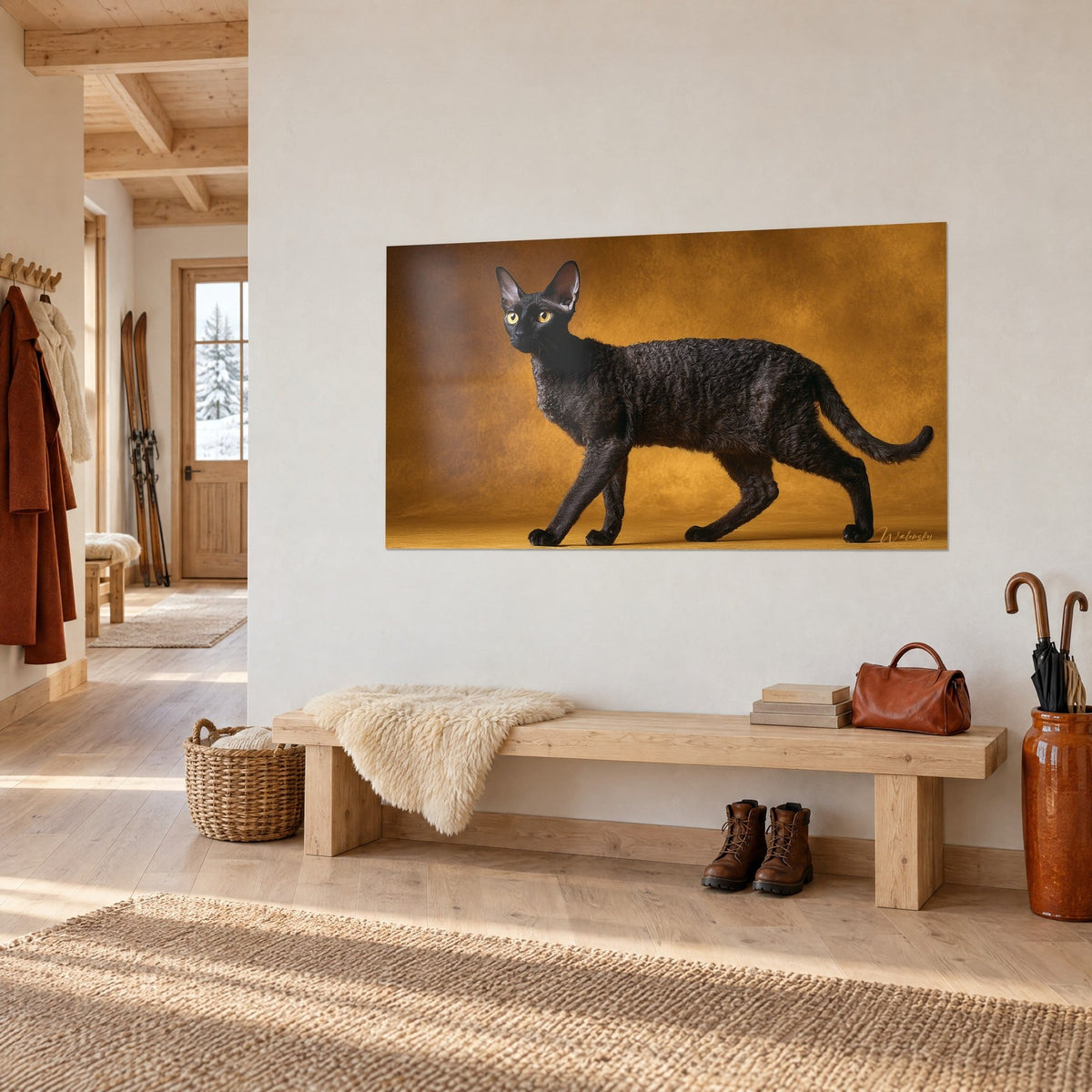 Wall art ebony Cornish Rex with large ears, crinkled coat and honey background, on a white chalet wall above a wooden bench