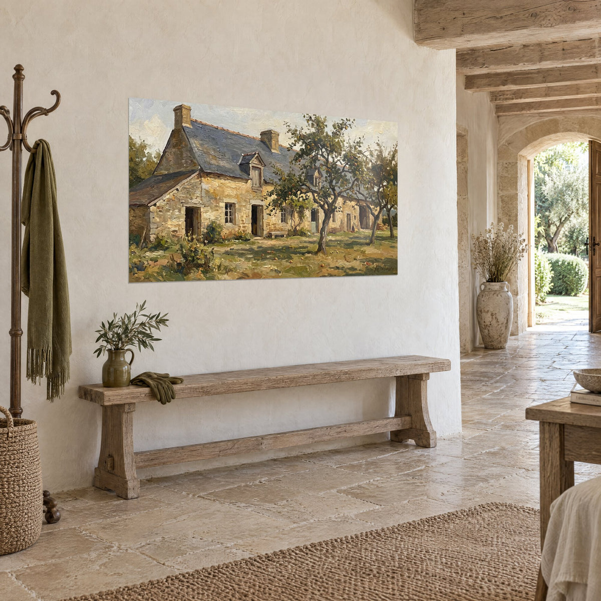 Wall art of an ochre granite cottage under a pale sky, two stone chimneys and grass dappled with shadows, on a rustic stone bench