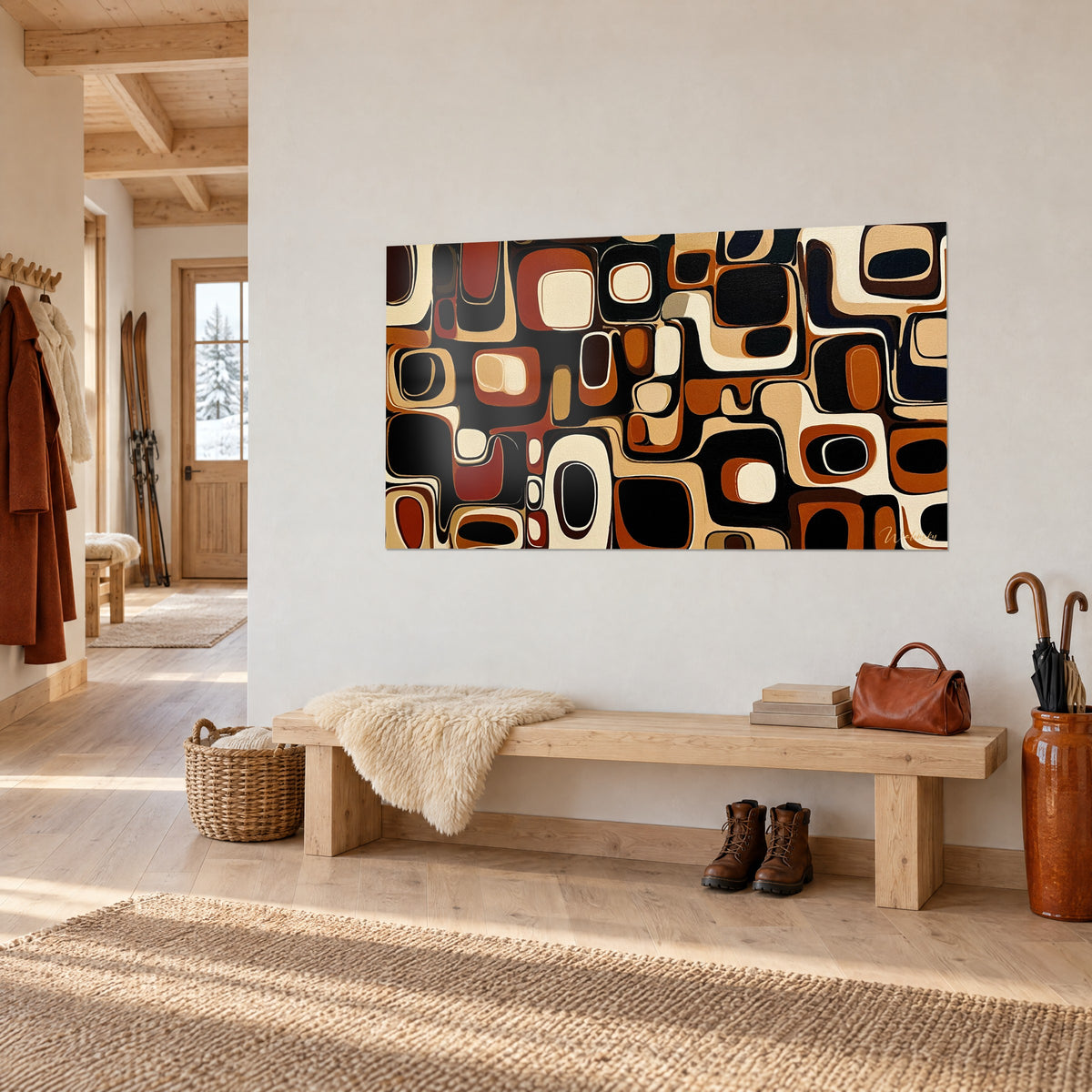 Tableau motifs géométriques abstraits crème et brun cuivré sur fond noir, vu de trois-quarts, banc en bois d'un chalet clair