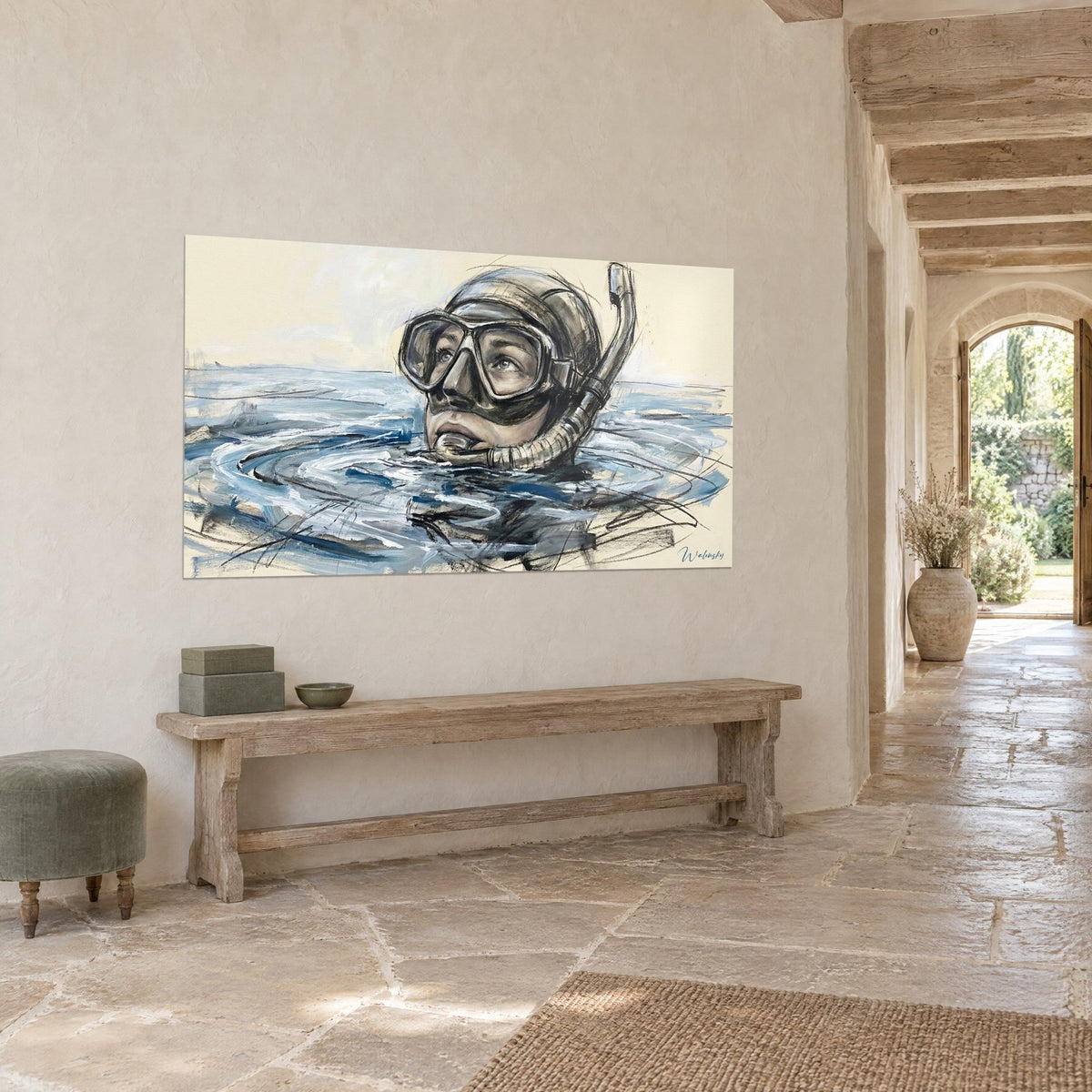 Wall art of a freediver, curved grey snorkel, cobalt blue and white swirls on an ivory background, stone wall of an arched entrance