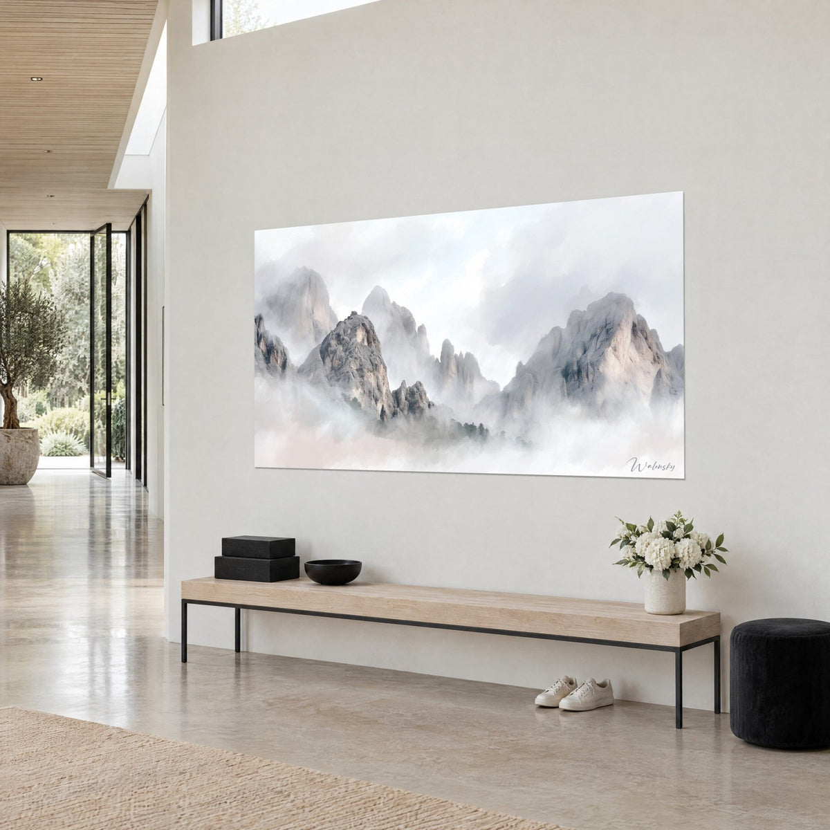 Wall art misty rocky summits, grey stone with soft pink touches, seen three-quarter view on a beige wall, architect's living room