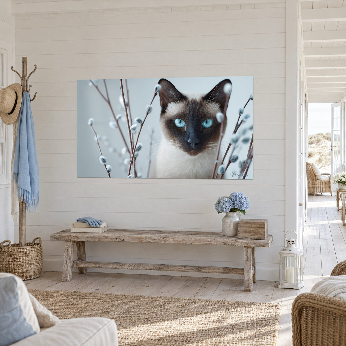 Wall art feline with dark brown mask and cream coat, glacier-blue gaze, willow branches, hung in a seaside house