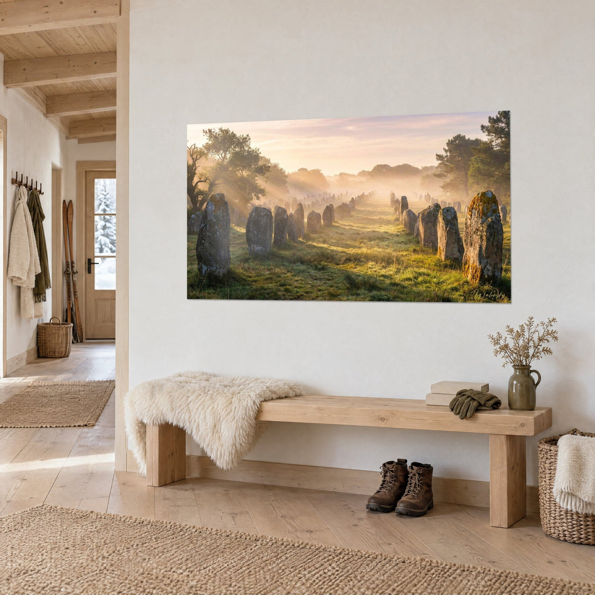 Wall art avenue of standing stones beneath a pink and amber sky, yellow lichen on grey granite, chalet entrance